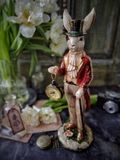 Фото Декоративная статуэтка Кролик с тростью и с часами 38.5 см